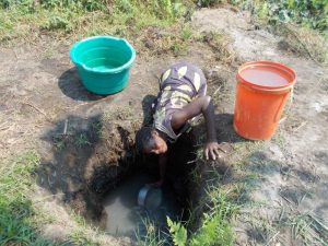 Africans, don't have pipes to deliver the water to their homes so they have to get their water from an open hole that's exposed to the elements and often shared with livestock and disease carrying wild animals.