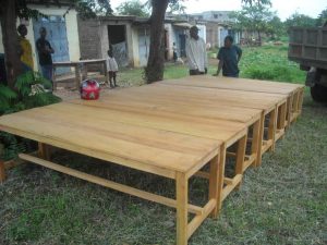 When we built the church, we also built tables and benches so that the church can be used as a school during the week.